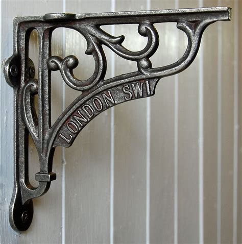 antique metal wall brackets|antique shelf brackets metal.